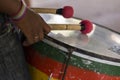 Hands of a musician playing percussion in presentation