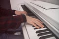 The hands of a musician playing the piano closeup Royalty Free Stock Photo