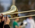 Hands of a musician playing a trombone at rehearsal Royalty Free Stock Photo