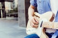 Hands of musician with guitar Royalty Free Stock Photo