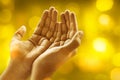 Hands of muslim man praying