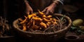 Hands near basket of tumeric roots. Indian, Asian or Mexican spices. Copy space