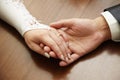 Hands of newly-married couple Royalty Free Stock Photo