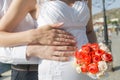 Hands of newly wedded after wedding ceremony