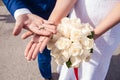 The hands of newlyweds hold the key to the lock of love, a symbol of a strong marriage. Wedding tradition. Hands of newlyweds Royalty Free Stock Photo