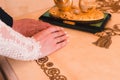 Hands of the newlyweds with wedding rings after the wedding ceremony on a luxurious table Royalty Free Stock Photo