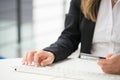 Hands of an office woman typing keyboard with credit card Royalty Free Stock Photo