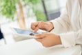 Hands of an office woman typing keyboard with credit card Royalty Free Stock Photo