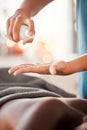 Hands, oil spray and back massage with masseuse, women at holistic center or spa with wellness, physical therapy and zen Royalty Free Stock Photo