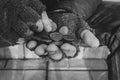 Hands in old torn gloves beggars, poverty, Russia poverty.