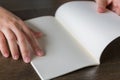 Hands open book Royalty Free Stock Photo