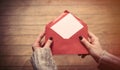 Hands opening envelope Royalty Free Stock Photo