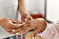 Hands of ouple on marriage proposal at the bedroom Royalty Free Stock Photo