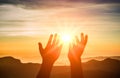 hands outstretched to sun at sunset. hands holding sun at dawn. Hope, Freedom and spirituality concept Royalty Free Stock Photo