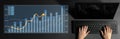 Hands Over Keyboard Analyzing Stock Market Trends with Graphs and Data Visualization on Computer Screen in Modern Royalty Free Stock Photo