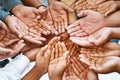 Hands, palm and diversity of people in circle of charity, support and community together from above. Closeup, helping