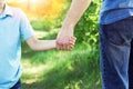 hands parent and child walking