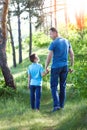 hands parent and child walking