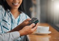 Hands paying bill with credit card payment for coffee or tea at cafe, coffee shop or restaurant close up. Woman making Royalty Free Stock Photo