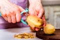 Hands peeling potatoes close Royalty Free Stock Photo