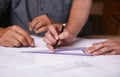 Hands, pencil and architect team drawing blueprint, construction and civil engineering with stationery. Design tools Royalty Free Stock Photo