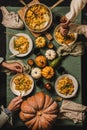 Hands of people celebrating Thanksgiving day with wine and pasta Royalty Free Stock Photo