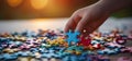 hands of people holding a colorful puzzle that is designed for autism Royalty Free Stock Photo