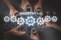 Hands of people holding gears. Industry 4.0