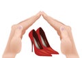 Hands of people protecting women`s red shoes- Royalty Free Stock Photo