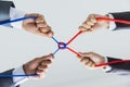 Hands of people pulling the rope, cooperation concept, Concept of business team using a rope as an element of the teamwork Royalty Free Stock Photo
