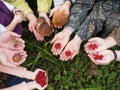 Hands of people stretch the gifts of the forest: mushrooms and berries. summer autumn harvest concept