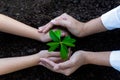 Hands People Team Work family Cupping young Plant Nurture Environmental and reduce global warming earth. Royalty Free Stock Photo