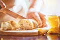 Person cutting bread