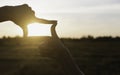 Hands of person making frame distance or symbol in nature Royalty Free Stock Photo