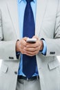 Hands, phone and businessperson in studio for communication, research and typing a message. Closeup, professional and