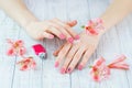 Hands with pink color nails manicure Royalty Free Stock Photo