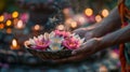 Hands with a plate of lotus flowers and incense in front of a Buddha statue on Vesak. AI Generated Royalty Free Stock Photo