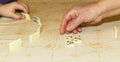 Hands of players who play dominoes Royalty Free Stock Photo