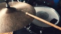 Hands playing drums with drumsticks with rock beat, hihat rythm