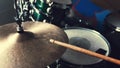 Hands playing drums with drumsticks with rock beat, hihat rythm