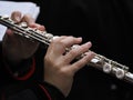 Hands playing flute detail Royalty Free Stock Photo