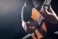 Hands playing guitar. Classical guitarist hands Royalty Free Stock Photo