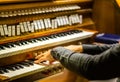 Hands playing organ keyboard Royalty Free Stock Photo