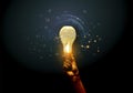 Hands pointing Light bulb on dark background - New icon business - creativity idea and concept - background innovation technology