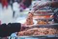 The hands of the poor have been begging to donate food from the donor, The concept of feeding Royalty Free Stock Photo