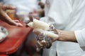 Hands of the poor receive food from the donor`s share. poverty concept Royalty Free Stock Photo