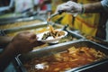The hands of the poor request food donations donated by philanthropists Royalty Free Stock Photo