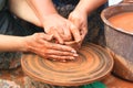 Hands of a potter closeup Royalty Free Stock Photo