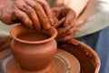 Potter making ceramic pot on the pottery wheel Royalty Free Stock Photo