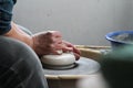 Hands potter, producing range of pot